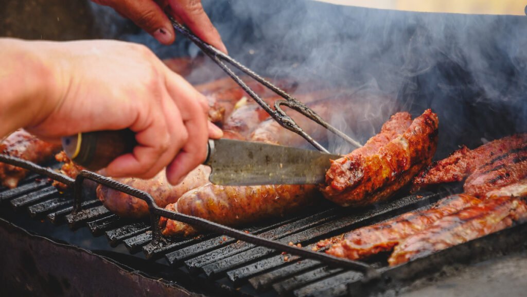 Chorizos cooked on the grill at the market in Nahuel Pan.