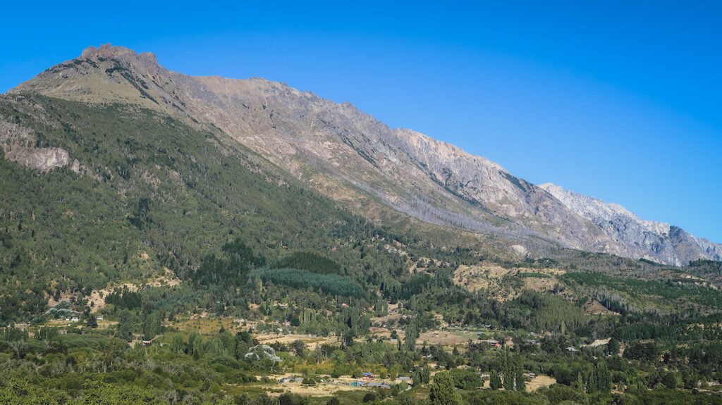 Views of the valley and a mountain range in the town of El Hoyo in Patagonia. 