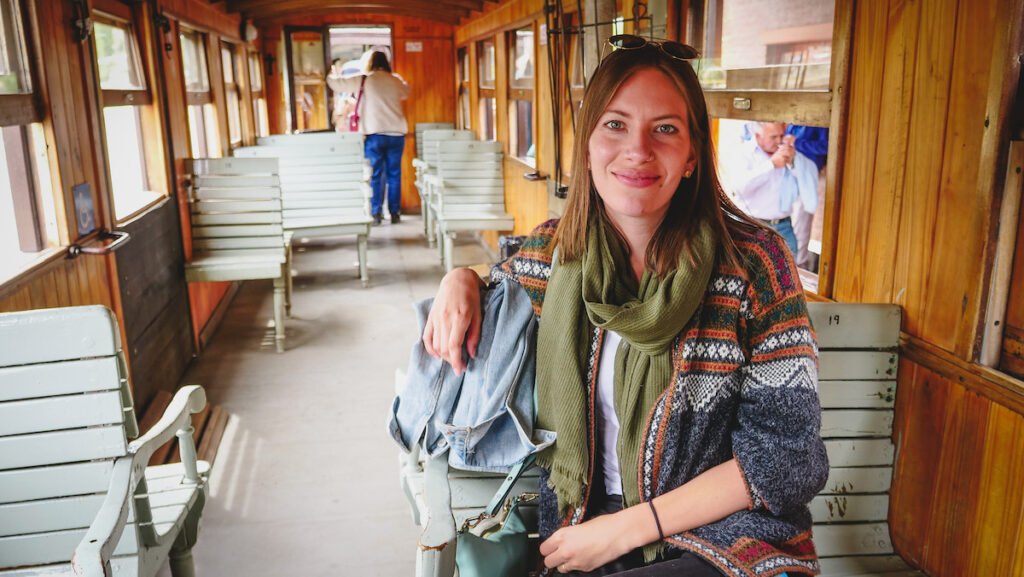Riding aboard the Old Patagonian Express where you can get wooden seats of leather seats.