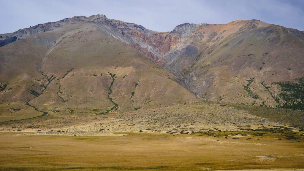 Mountain views on the train journey to Nahuel Pan aboard La Trochita. Mountain views on the train journey to Nahuel Pan aboard La Trochita.