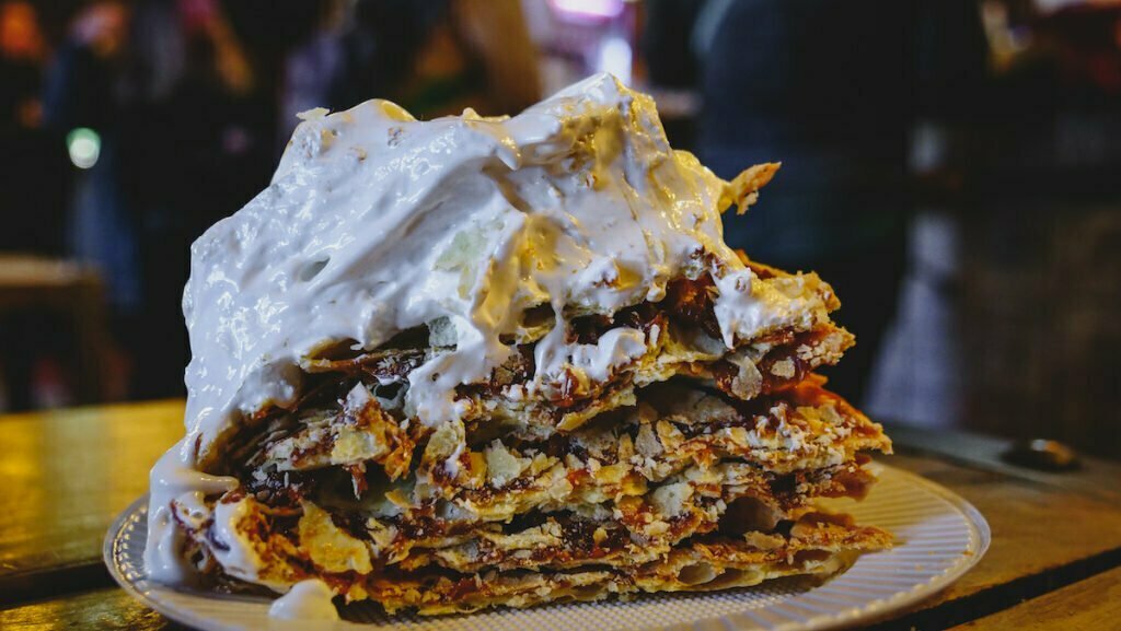 Rogel cake is a traditional Argentine dessert consisting of thin flakey layers filled with dulce de leche 