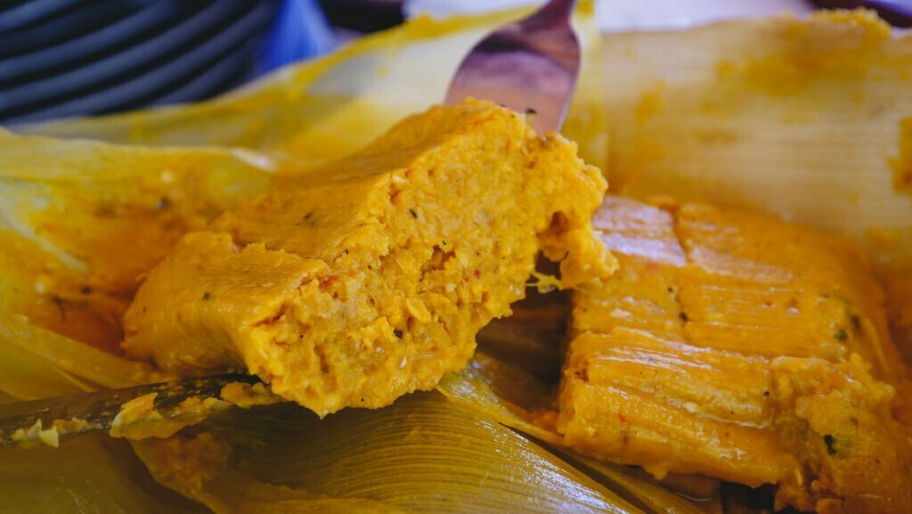 Eating humitas in Amaicha del Valle, Tucuman 