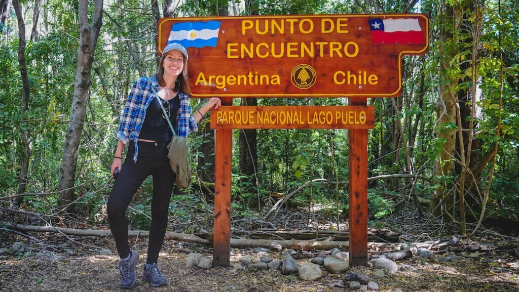 The sign that marks the border between Argentina and Chile in Lago Puelo National Park.