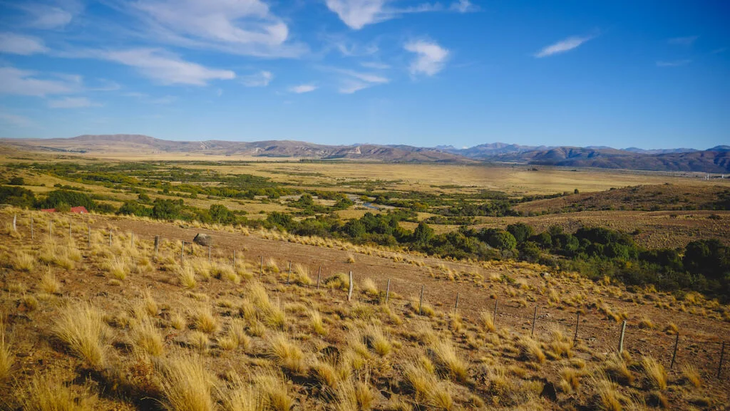 Patagonian steppe scenery while traveling from Bariloche to Viedma in Argentina.