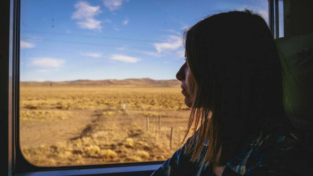 Enjoying views of the Patagonian steppe while crossing Patagonia by train.