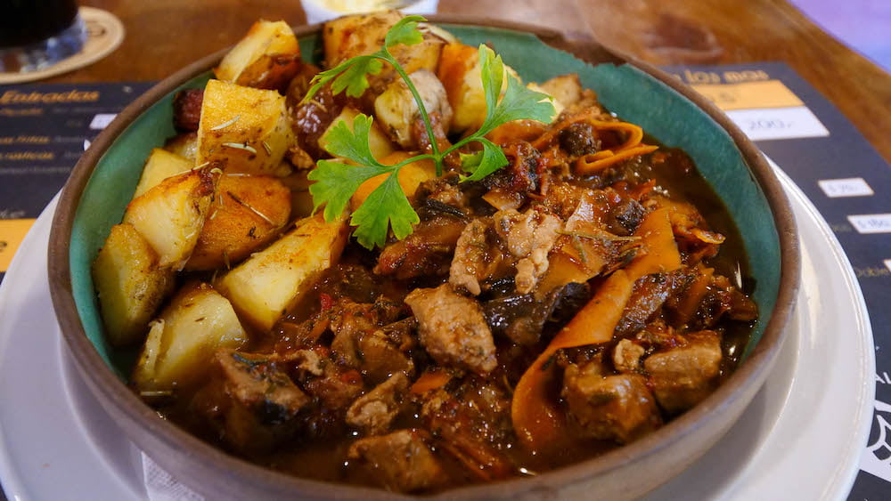 A bowl of wild boar stew at Gilbert Brewery in Bariloche, Patagonia