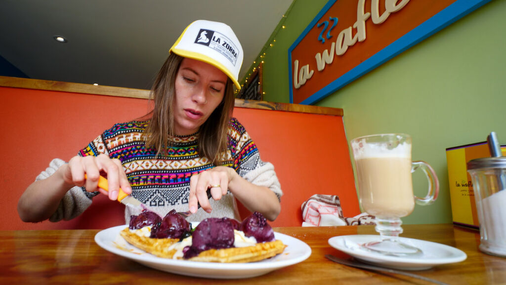 Eating waffles with calafate berry ice cream at La Wafleria in El Chalten.