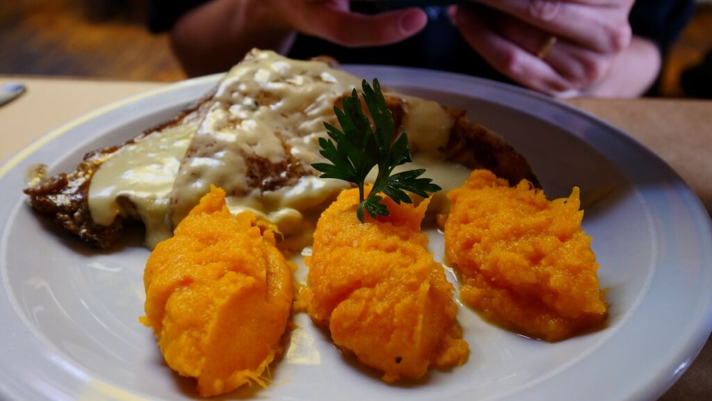 Cod with roquefort cheese at Bodegon Fueguino restaurant in Ushuaia 