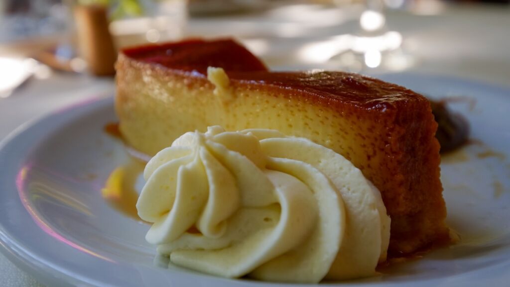 Flan with dulce de leche and cream - a traditional Argentine dessert 