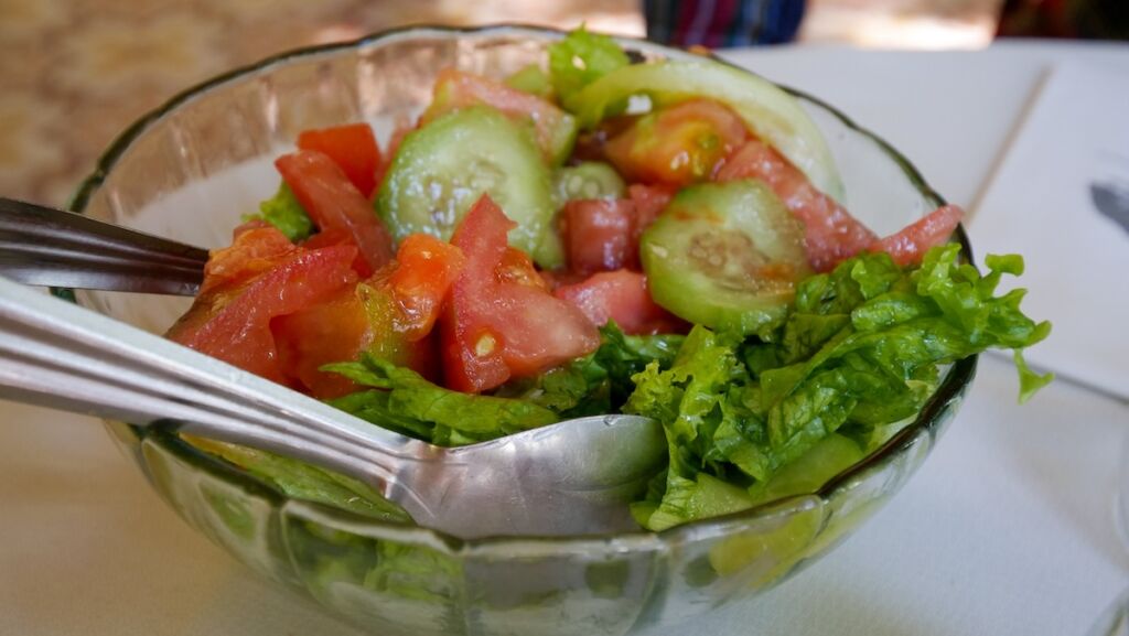 Lettuce, tomato and cucumber salad to accompany the BBQ. 