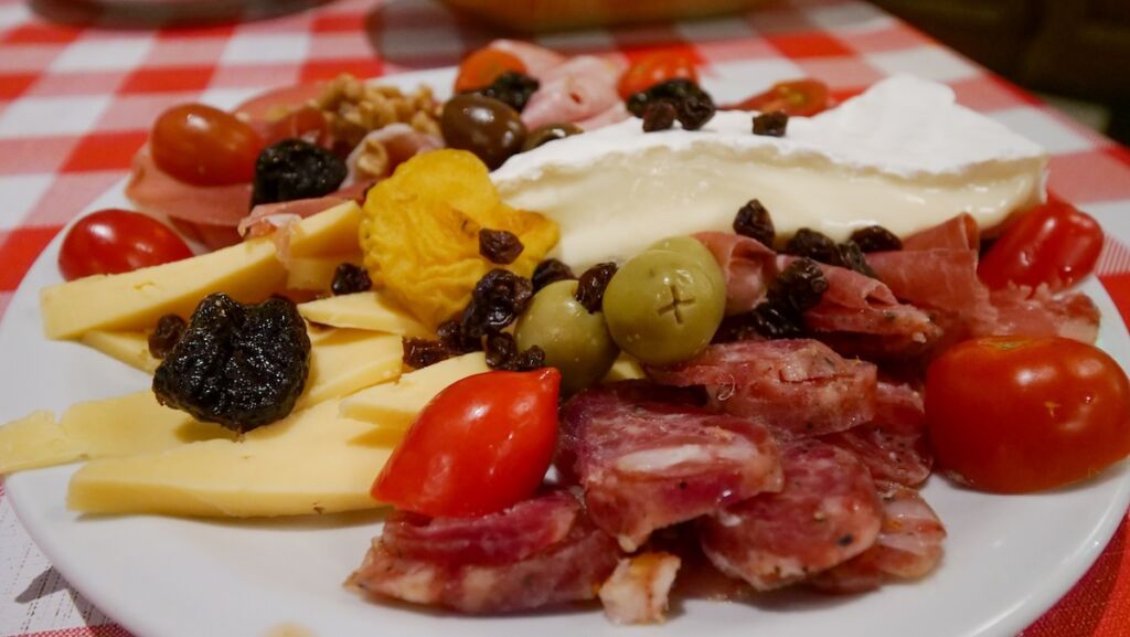 Picada is an argentine snacking board featuring deli meats, cheeses, nuts and more 