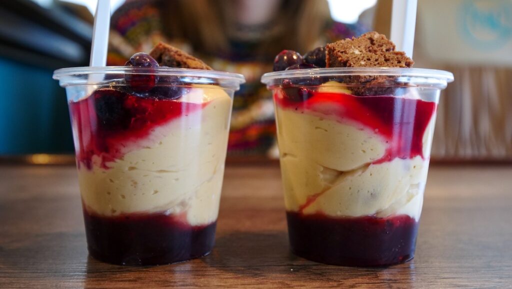 Brownie and dulce de leche mousse dessert with berries served on the Gourmet Glaciers boat cruise 