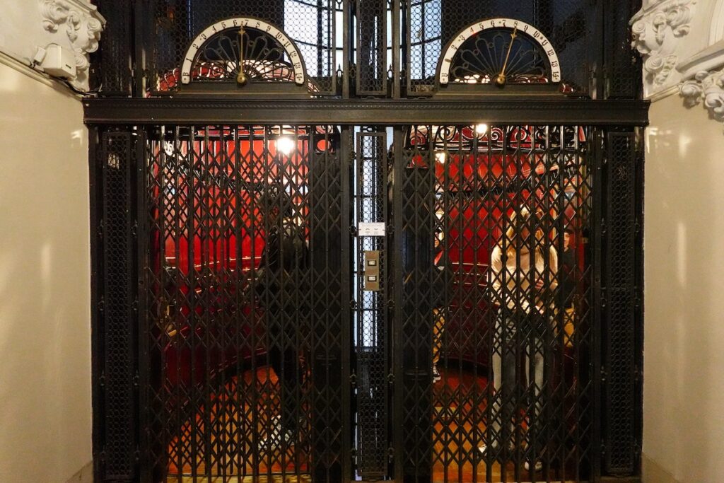 Old fashioned elevators inside Barolo Palace 