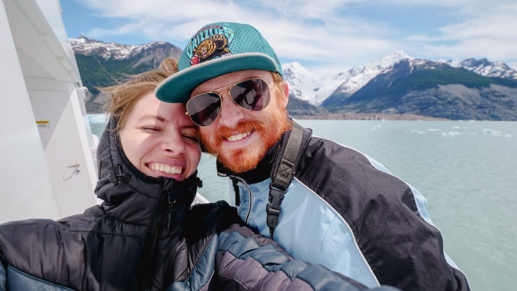 Samuel and Audrey enjoying a glacier boat tour in El Calafate, Argentina