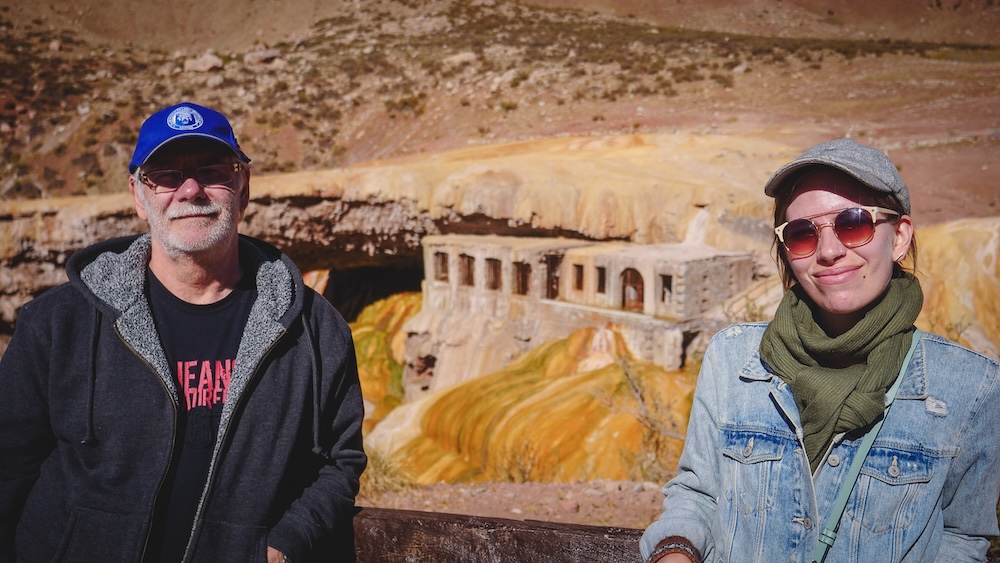 Daniel and Audrey posing for a photo in front of the Puente del Inca in Mendoza Province.