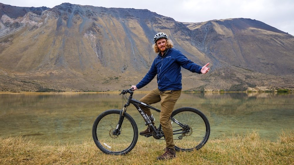 Samuel posing in front of Laguna Willmanco after biking there from Esquel, Chubut.