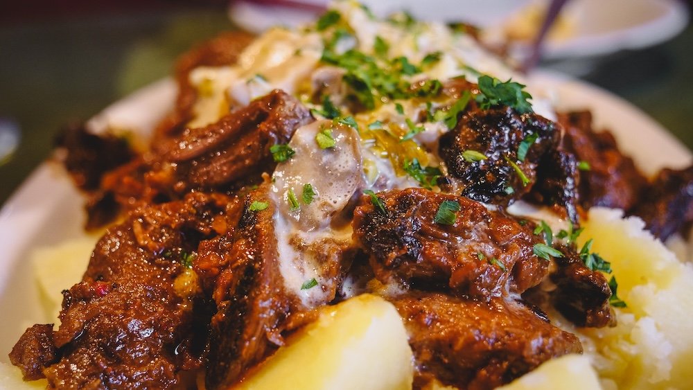 Deer hunter's stew is a dish that is eaten across Patagonia. Here it is served with potatoes.