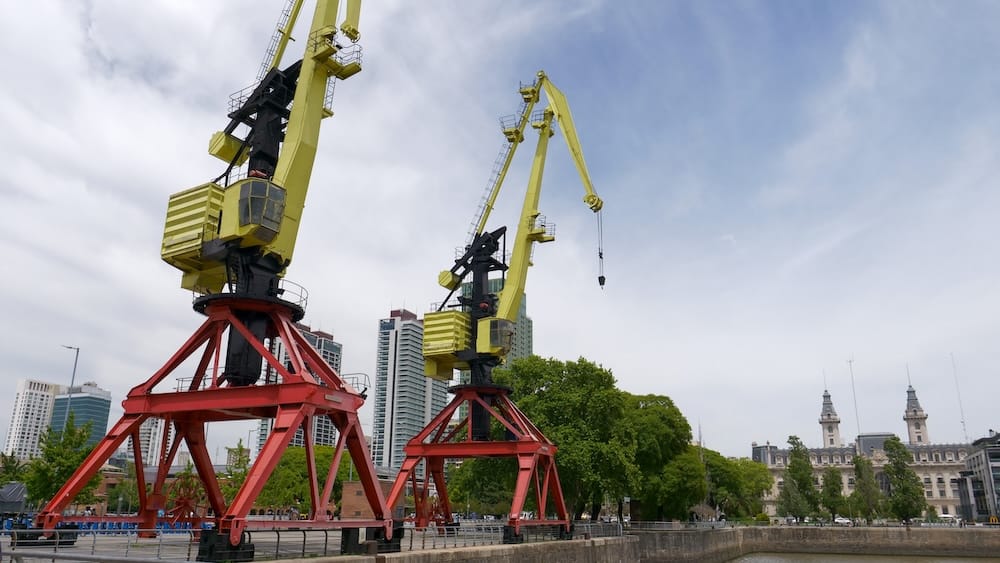 Two yellow cranes in Puerto Madero. These were once used to load grains and cargo onto ships bound for Europe.