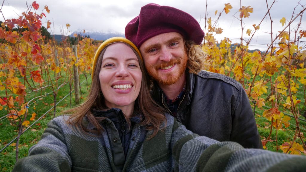 Audrey Bergner and Samuel Jeffery, founders of the Samuel & Audrey Media Network and Che Argentina Travel, exploring a high-altitude vineyard in Trevelin, Chubut, Patagonia.