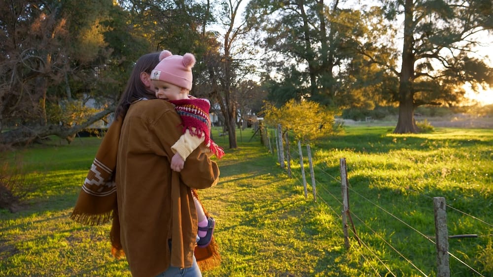 Audrey hugging Aurelia and spinning during sunset at La Tomasa, an estancia in Buenos Aires Province.