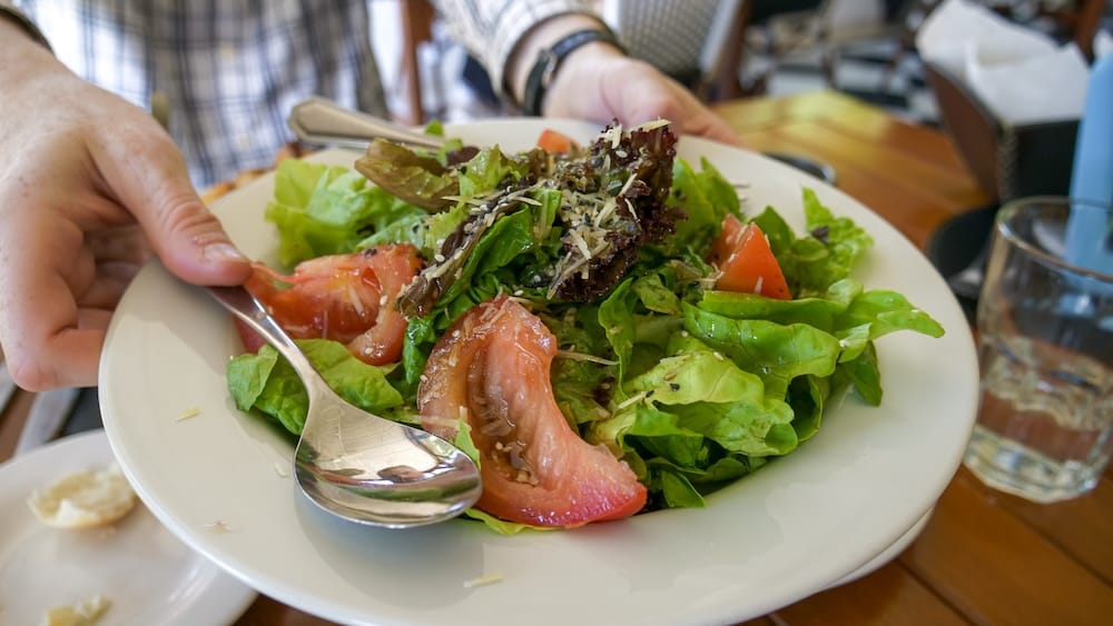 Bowl of salad to accompany the steak lunch.