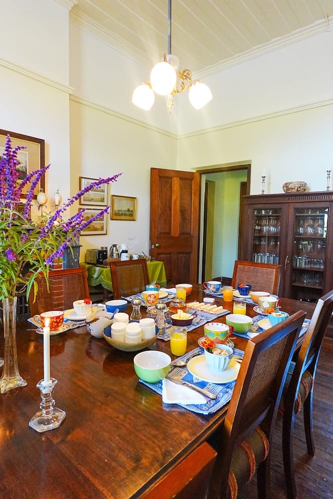 Breakfast table set in the main dining room of the estancia.