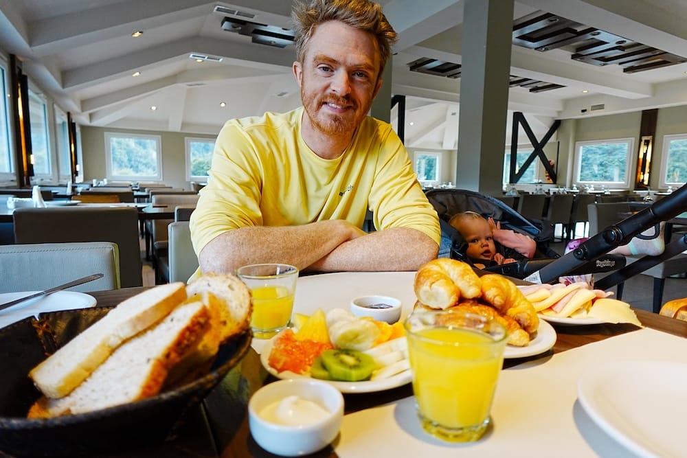 Samuel eating breakfast at the hotel.