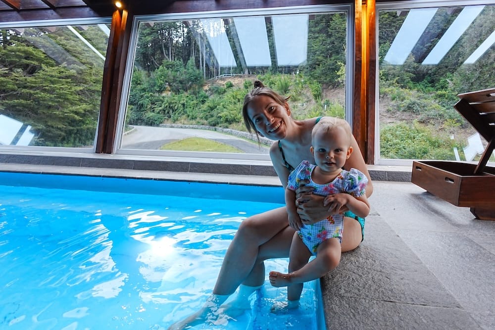 Audrey and Aurelia enjoying the heated pool at Hotel Puerto Blest, Argentina.