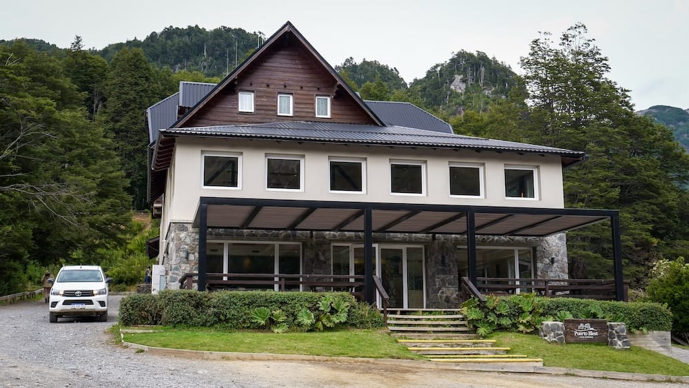 Side view of the hotel with the forest in the background.