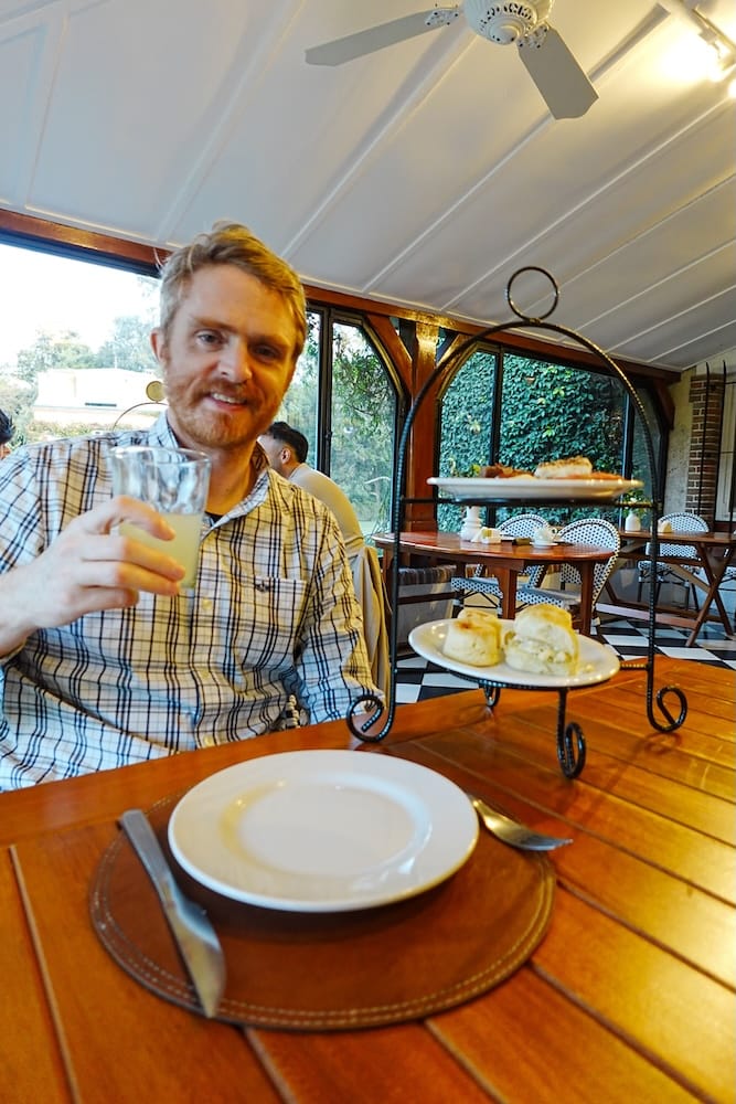 Samuel enjoying afternoon tea or merienda at Estancia Villa Maria.