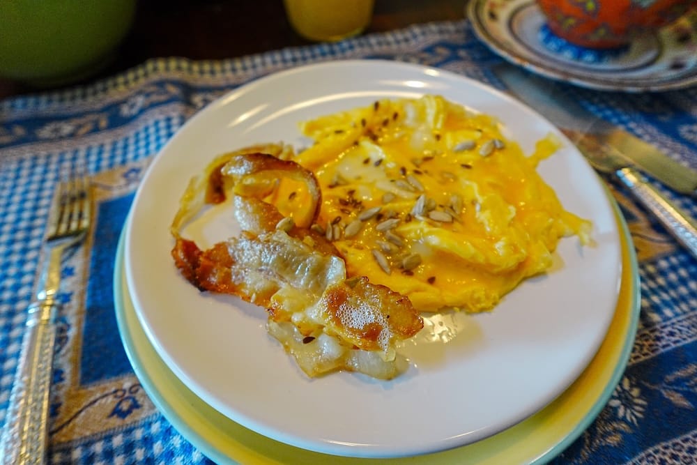 Scrambled eggs and bacon for breakfast.
